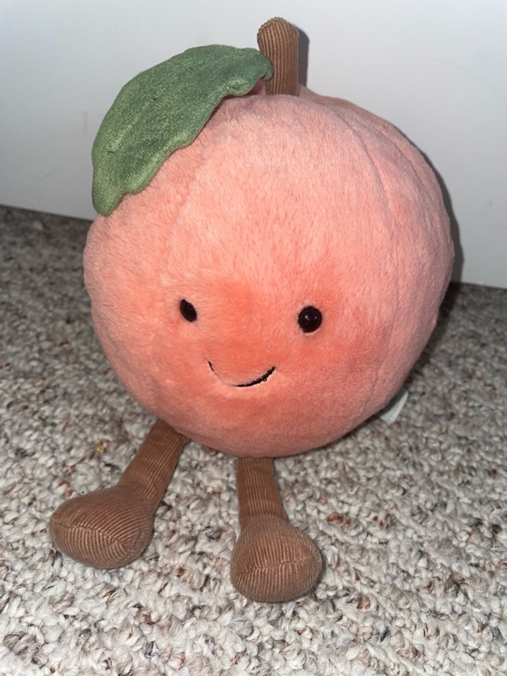 Jellycat Peach Plush with Green Leaf and Brown Corduroy Legs
